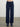 Person wearing the Cashmere Sweats, a blue cashmere sweat pant by Margaret O'Leary.