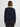 Back view of a person wearing the Jacquard Vee, a black and blue patterned sweater by Margaret O'Leary paired with black pants.