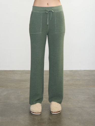 Person wearing the Joan Waffle Pant, a green waffle knit pant by Margaret O'Leary.