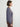 Person wearing the Lola Pullover, a blue and brown boucle pullover by Margaret O'Leary paired with brown pants.