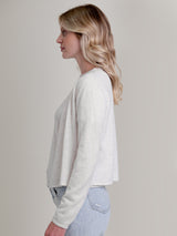 Woman wearing the Cashmere Ballet Wrap in mist by Margaret O'Leary.