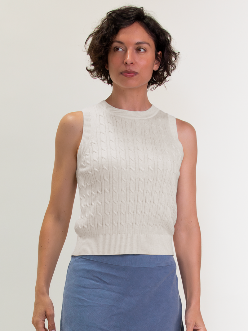 Woman wearing the Nina Cable Cardi in Ivory by Margaret O'Leary.