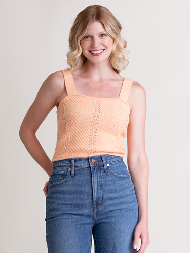 Woman wearing the Tia Knit Cami in Apricot by Margaret O'Leary.