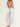 Woman wearing the Bella Boatneck in Sky by Margaret O'Leary.