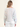 Woman wearing the Bella Boatneck in Sky by Margaret O'Leary.