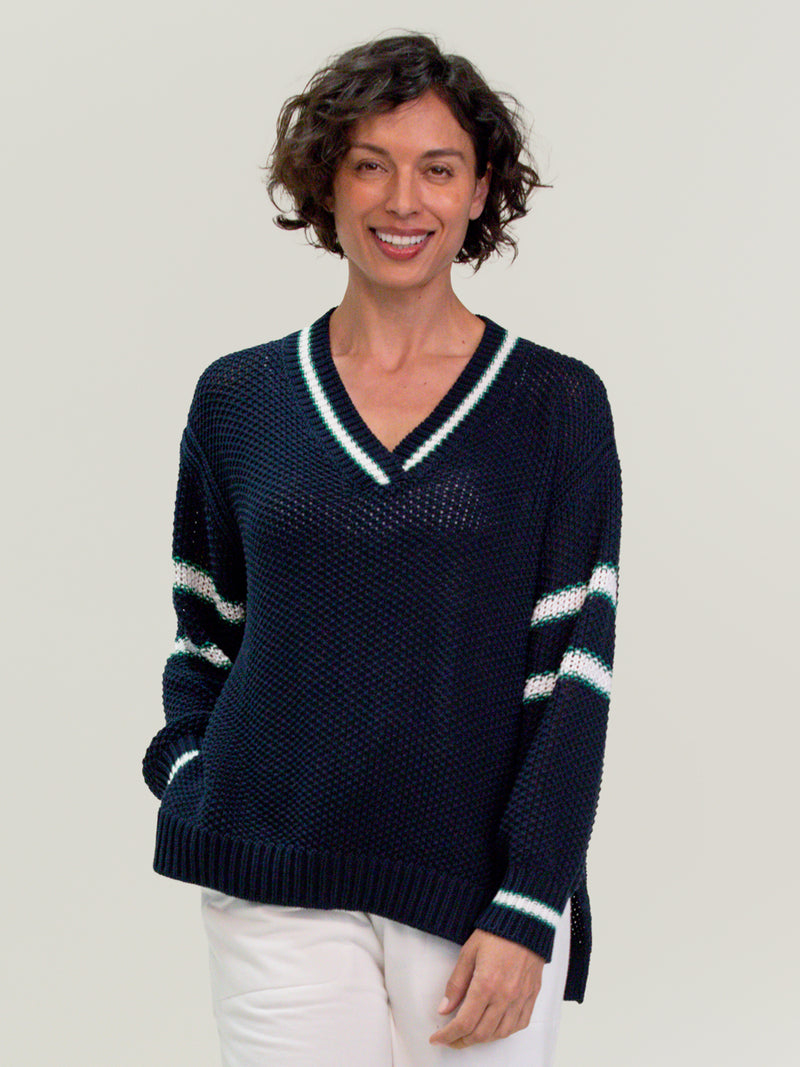 Woman wearing the Tennis Vee in Navy Mix by Margaret O'Leary.