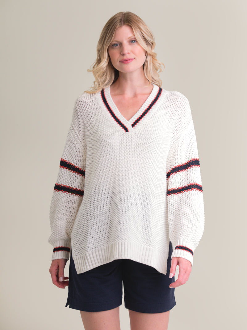 Woman wearing the Tennis Vee in Ivory Mix by Margaret O'Leary.