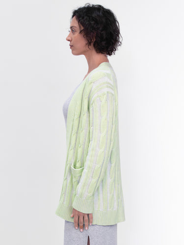 Woman wearing the Nina Cable Cardi by Margaret O'Leary.