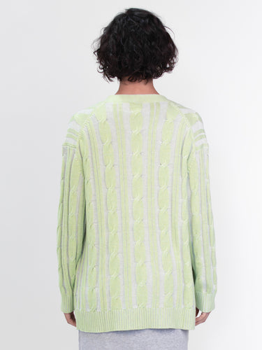 Woman wearing the Nina Cable Cardi by Margaret O'Leary.