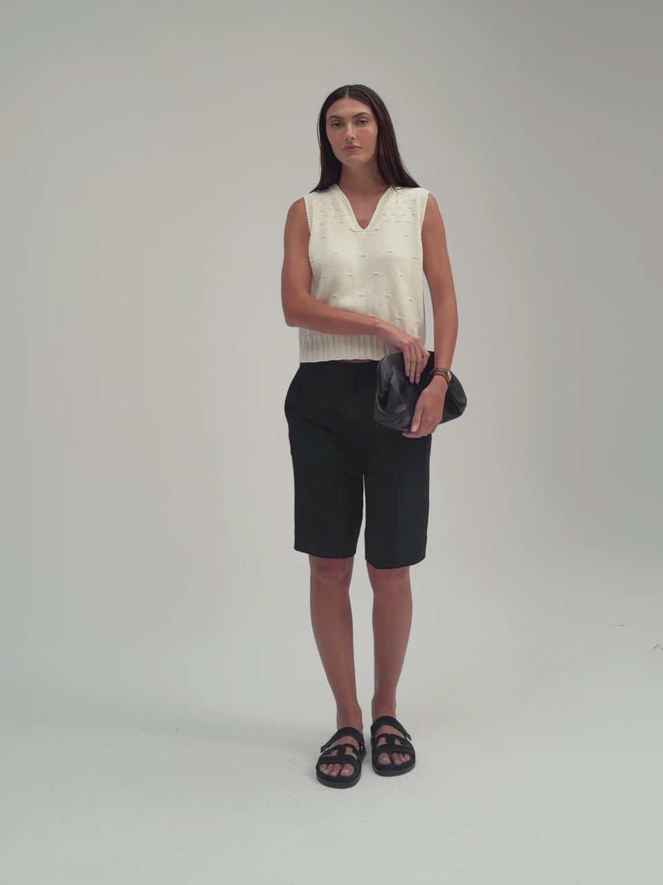Nina Split Neck Tank by Margaret O’Leary, sleeveless knit tank with split neckline and fitted silhouette.