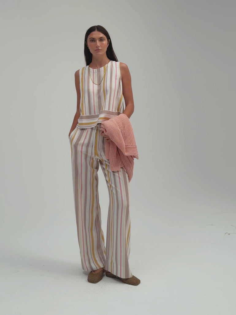 Avery Button Back Tank by Margaret O’Leary, sleeveless knit tank with button-back detail.
Vida Pant by Margaret O’Leary, wide-leg pant with relaxed fit and soft drape.
