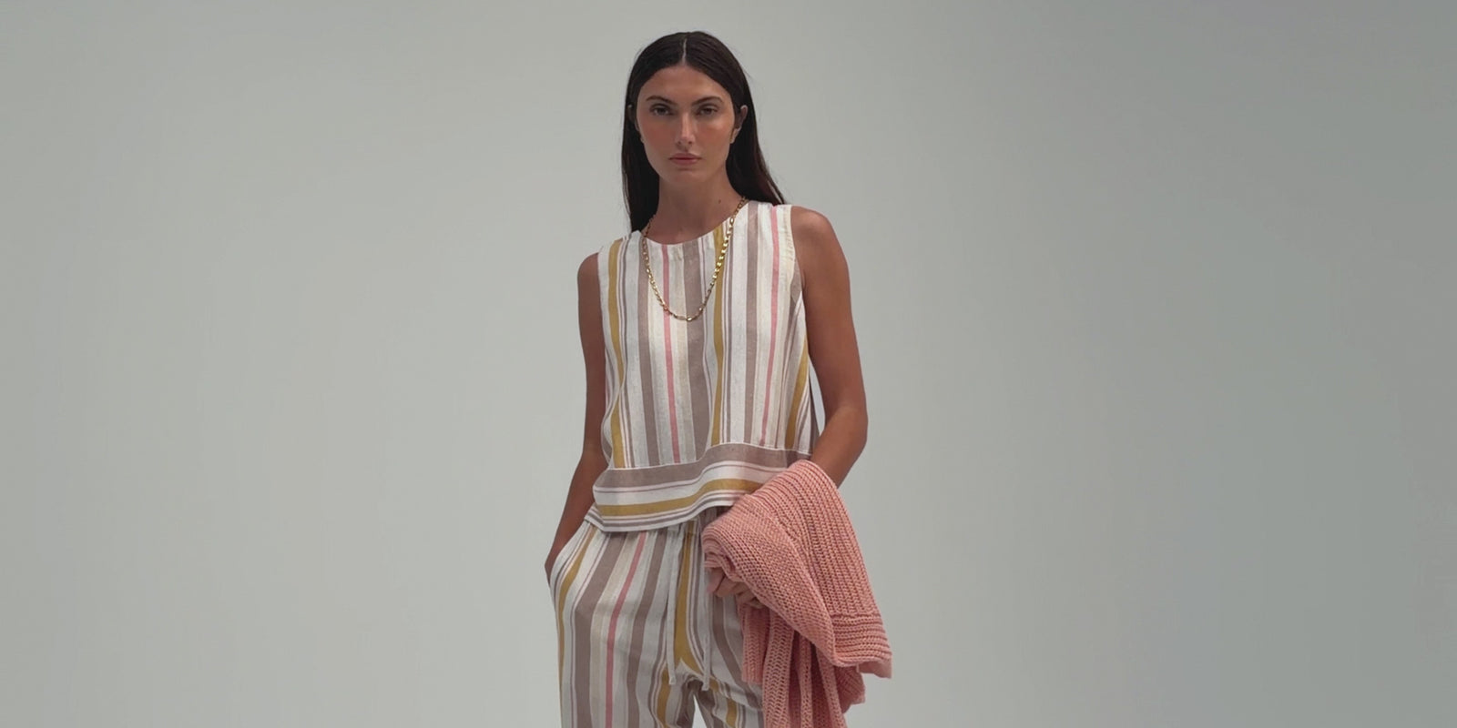 Model wearing Margaret O’Leary Spring Summer collection in lightweight knits and sets.