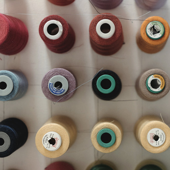 Board of spools in different colors.