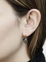 14 karat gold single earring and heart in vegetal ivory set with an emerald and fresh water pearls.