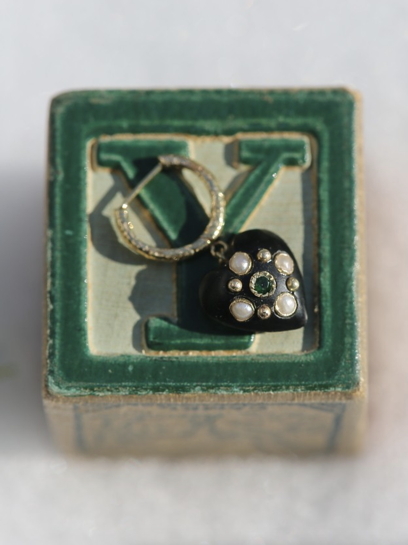 14 karat gold single earring and heart in vegetal ivory set with an emerald and fresh water pearls.