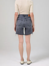 Back view of the grey denim shorts.