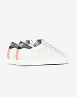 A pair of white and grey glitter sneakers, set against a bright white background.