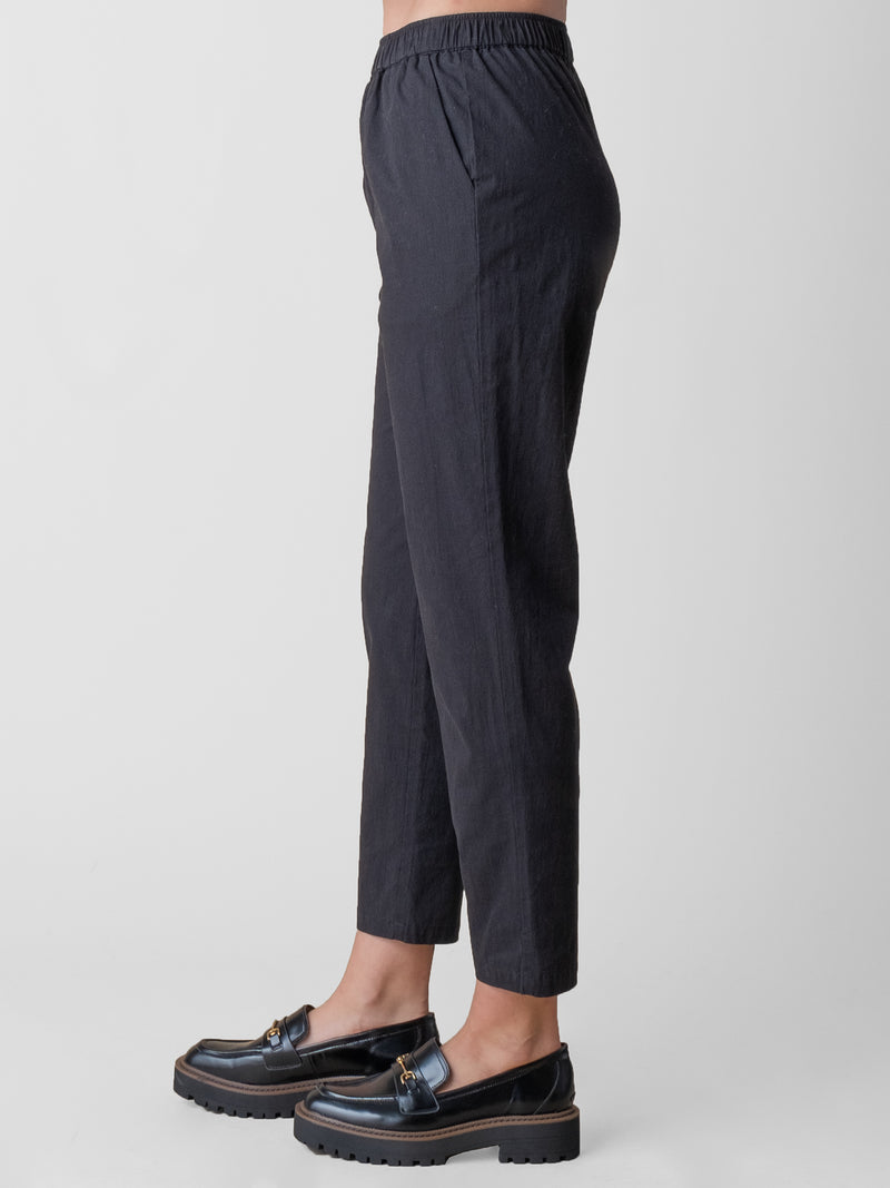Side view of the pull on pant in black.